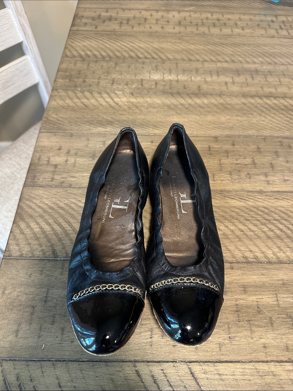 Taryn Rose Black Leather Cap-Toe Flats with Gold Chain Accent